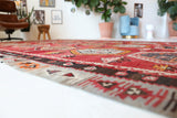 Vintage kilim rug in room decor setting, old rug, antique rug, pastel colors, faded colors, Turkish rug, vintage rug, soft rug, Portland, Oregon, rug store, rug shop, local shop, bold colors, bright colors, faded colors
