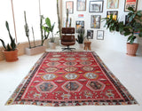Vintage kilim rug in room decor setting, old rug, antique rug, pastel colors, faded colors, Turkish rug, vintage rug, soft rug, Portland, Oregon, rug store, rug shop, local shop, bold colors, bright colors, faded colors