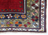 Vintage Turkish rug in a living room setting, pile rug, Turkish rug, vintage rug, portland, rug shop, bright colors, wild shaman, soft rug, bold color, Portland, Oregon, rug store, rug shop, local shop, antique rug