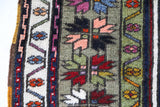 Vintage Turkish rug in a living room setting, pile rug, Turkish rug, vintage rug, portland, rug shop, bright colors, wild shaman, soft rug, bold color, Portland, Oregon, rug store, rug shop, local shop, antique rug