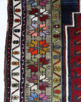 Vintage Turkish rug in a living room setting, pile rug, Turkish rug, vintage rug, portland, rug shop, bright colors, wild shaman, soft rug, bold color, Portland, Oregon, rug store, rug shop, local shop, antique rug