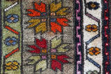 Vintage Turkish rug in a living room setting, pile rug, Turkish rug, vintage rug, portland, rug shop, bright colors, wild shaman, soft rug, bold color, Portland, Oregon, rug store, rug shop, local shop, antique rug