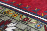 Vintage Turkish rug in a living room setting, pile rug, Turkish rug, vintage rug, portland, rug shop, bright colors, wild shaman, soft rug, bold color, Portland, Oregon, rug store, rug shop, local shop, antique rug