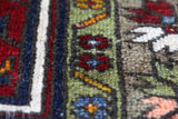 Vintage Turkish rug in a living room setting, pile rug, Turkish rug, vintage rug, portland, rug shop, bright colors, wild shaman, soft rug, bold color, Portland, Oregon, rug store, rug shop, local shop, antique rug
