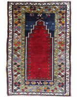 Vintage Turkish rug in a living room setting, pile rug, Turkish rug, vintage rug, portland, rug shop, bright colors, wild shaman, soft rug, bold color, Portland, Oregon, rug store, rug shop, local shop, antique rug