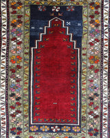 Vintage Turkish rug in a living room setting, pile rug, Turkish rug, vintage rug, portland, rug shop, bright colors, wild shaman, soft rug, bold color, Portland, Oregon, rug store, rug shop, local shop, antique rug