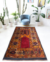 Vintage Turkish rug in a living room setting, pile rug, Turkish rug, vintage rug, portland, rug shop, bright colors, wild shaman, soft rug, bold color, Portland, Oregon, rug store, rug shop, local shop, antique rug