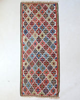 Vintage Turkish runner rug in a living room setting, pile rug, Turkish rug, vintage rug, portland, rug shop, bright colors, wild shaman, soft rug, bold color, Portland, Oregon, rug store, rug shop, local shop, antique rug