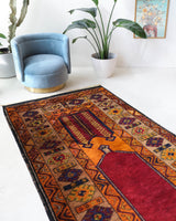 Vintage Turkish rug in a living room setting, pile rug, Turkish rug, vintage rug, portland, rug shop, bright colors, wild shaman, soft rug, bold color, Portland, Oregon, rug store, rug shop, local shop, antique rug