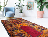 Vintage Turkish rug in a living room setting, pile rug, Turkish rug, vintage rug, portland, rug shop, bright colors, wild shaman, soft rug, bold color, Portland, Oregon, rug store, rug shop, local shop, antique rug