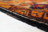 Vintage Turkish rug in a living room setting, pile rug, Turkish rug, vintage rug, portland, rug shop, bright colors, wild shaman, soft rug, bold color, Portland, Oregon, rug store, rug shop, local shop, antique rug