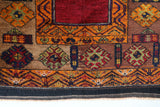 Vintage Turkish rug in a living room setting, pile rug, Turkish rug, vintage rug, portland, rug shop, bright colors, wild shaman, soft rug, bold color, Portland, Oregon, rug store, rug shop, local shop, antique rug