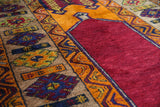 Vintage Turkish rug in a living room setting, pile rug, Turkish rug, vintage rug, portland, rug shop, bright colors, wild shaman, soft rug, bold color, Portland, Oregon, rug store, rug shop, local shop, antique rug