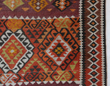 Vintage Turkish runner rug in a living room setting, pile rug, Turkish rug, vintage rug, portland, rug shop, bright colors, wild shaman, soft rug, bold color, Portland, Oregon, rug store, rug shop, local shop, antique rug