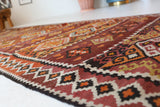 Vintage Turkish runner rug in a living room setting, pile rug, Turkish rug, vintage rug, portland, rug shop, bright colors, wild shaman, soft rug, bold color, Portland, Oregon, rug store, rug shop, local shop, antique rug