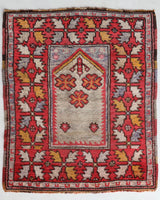 Small Turkish rug in a living room setting, pile rug, Turkish rug, vintage rug, portland, rug shop, bright colors, wild shaman, area rug, red rug, mini rug, bold color, Portland, Oregon, rug store, rug shop, local shop, flat weave, kilim rug