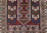 Vintage Turkish mini rug in room decor setting, old rug, antique rug, pastel colors, faded colors, Turkish rug, vintage rug, soft rug, Portland, Oregon, rug store, rug shop, local shop,  bright colors, bold colors
