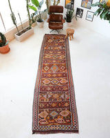 Vintage Turkish runner rug in a living room setting, pile rug, Turkish rug, vintage rug, portland, rug shop, bright colors, wild shaman, soft rug, bold color, Portland, Oregon, rug store, rug shop, local shop, antique rug