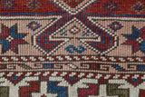 Vintage Turkish mini rug in room decor setting, old rug, antique rug, pastel colors, faded colors, Turkish rug, vintage rug, soft rug, Portland, Oregon, rug store, rug shop, local shop,  bright colors, bold colors