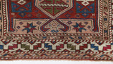 Vintage Turkish mini rug in room decor setting, old rug, antique rug, pastel colors, faded colors, Turkish rug, vintage rug, soft rug, Portland, Oregon, rug store, rug shop, local shop,  bright colors, bold colors