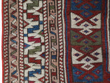 Vintage Turkish mini rug in room decor setting, old rug, antique rug, pastel colors, faded colors, Turkish rug, vintage rug, soft rug, Portland, Oregon, rug store, rug shop, local shop,  bright colors, bold colors