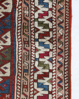 Vintage Turkish mini rug in room decor setting, old rug, antique rug, pastel colors, faded colors, Turkish rug, vintage rug, soft rug, Portland, Oregon, rug store, rug shop, local shop,  bright colors, bold colors