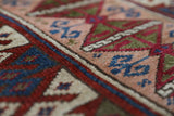 Vintage Turkish mini rug in room decor setting, old rug, antique rug, pastel colors, faded colors, Turkish rug, vintage rug, soft rug, Portland, Oregon, rug store, rug shop, local shop,  bright colors, bold colors