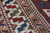 Vintage Turkish mini rug in room decor setting, old rug, antique rug, pastel colors, faded colors, Turkish rug, vintage rug, soft rug, Portland, Oregon, rug store, rug shop, local shop,  bright colors, bold colors