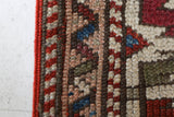 Vintage Turkish mini rug in room decor setting, old rug, antique rug, pastel colors, faded colors, Turkish rug, vintage rug, soft rug, Portland, Oregon, rug store, rug shop, local shop,  bright colors, bold colors