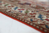 Vintage Turkish mini rug in room decor setting, old rug, antique rug, pastel colors, faded colors, Turkish rug, vintage rug, soft rug, Portland, Oregon, rug store, rug shop, local shop,  bright colors, bold colors