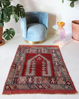 Small Turkish rug in a living room setting, pile rug, Turkish rug, vintage rug, portland, rug shop, bright colors, wild shaman, area rug, red rug, mini rug, bold color, Portland, Oregon, rug store, rug shop, local shop, flat weave, kilim rug