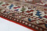 Vintage Turkish mini rug in room decor setting, old rug, antique rug, pastel colors, faded colors, Turkish rug, vintage rug, soft rug, Portland, Oregon, rug store, rug shop, local shop,  bright colors, bold colors