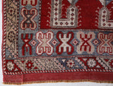 Small Turkish rug in a living room setting, pile rug, Turkish rug, vintage rug, portland, rug shop, bright colors, wild shaman, area rug, red rug, mini rug, bold color, Portland, Oregon, rug store, rug shop, local shop, flat weave, kilim rug
