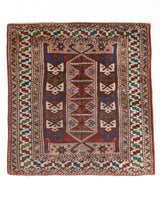 Vintage Turkish mini rug in room decor setting, old rug, antique rug, pastel colors, faded colors, Turkish rug, vintage rug, soft rug, Portland, Oregon, rug store, rug shop, local shop,  bright colors, bold colors