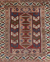 Vintage Turkish mini rug in room decor setting, old rug, antique rug, pastel colors, faded colors, Turkish rug, vintage rug, soft rug, Portland, Oregon, rug store, rug shop, local shop,  bright colors, bold colors