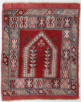 Small Turkish rug in a living room setting, pile rug, Turkish rug, vintage rug, portland, rug shop, bright colors, wild shaman, area rug, red rug, mini rug, bold color, Portland, Oregon, rug store, rug shop, local shop, flat weave, kilim rug