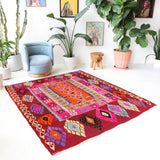 Vintage Turkish rug in a living room setting, pile rug, Turkish rug, vintage rug, portland, rug shop, bright colors, wild shaman, soft rug, bold color, Portland, Oregon, rug store, rug shop, local shop, antique rug