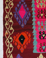 Vintage Turkish rug in a living room setting, pile rug, Turkish rug, vintage rug, portland, rug shop, bright colors, wild shaman, soft rug, bold color, Portland, Oregon, rug store, rug shop, local shop, antique rug