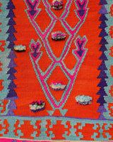 Vintage Turkish rug in a living room setting, pile rug, Turkish rug, vintage rug, portland, rug shop, bright colors, wild shaman, soft rug, bold color, Portland, Oregon, rug store, rug shop, local shop, antique rug