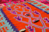 Vintage Turkish rug in a living room setting, pile rug, Turkish rug, vintage rug, portland, rug shop, bright colors, wild shaman, soft rug, bold color, Portland, Oregon, rug store, rug shop, local shop, antique rug