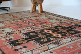 Vintage kilim rug in living room setting, old rug, antique rug, pastel colors, faded colors, Turkish rug, vintage rug, soft rug, Portland, Oregon, rug store, rug shop, local shop, earthy tones, earthy colors, warm colors