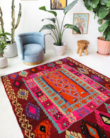 Vintage Turkish rug in a living room setting, pile rug, Turkish rug, vintage rug, portland, rug shop, bright colors, wild shaman, soft rug, bold color, Portland, Oregon, rug store, rug shop, local shop, antique rug