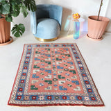Small Turkish rug in a living room setting, pile rug, Turkish rug, vintage rug, portland, rug shop, bright colors, wild shaman, area rug, red rug, mini rug, bold color, Portland, Oregon, rug store, rug shop, local shop, flat weave, kilim rug