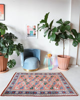 Small Turkish rug in a living room setting, pile rug, Turkish rug, vintage rug, portland, rug shop, bright colors, wild shaman, area rug, red rug, mini rug, bold color, Portland, Oregon, rug store, rug shop, local shop, flat weave, kilim rug