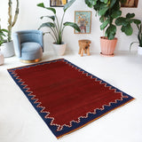 Vintage kilim rug in living room setting, bright colors, wild shaman, soft rug, bold color, Portland, Oregon, rug store, rug shop, local shop, vintage rug, modern kilim, warm colors, antique kilim rug