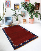 Vintage kilim rug in living room setting, bright colors, wild shaman, soft rug, bold color, Portland, Oregon, rug store, rug shop, local shop, vintage rug, modern kilim, warm colors, antique kilim rug