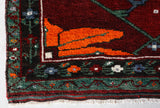 Small Turkish rug in a living room setting, pile rug, Turkish rug, vintage rug, portland, rug shop, bright colors, wild shaman, area rug, red rug, mini rug, bold color, Portland, Oregon, rug store, rug shop, local shop, flat weave, kilim rug