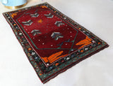 Small Turkish rug in a living room setting, pile rug, Turkish rug, vintage rug, portland, rug shop, bright colors, wild shaman, area rug, red rug, mini rug, bold color, Portland, Oregon, rug store, rug shop, local shop, flat weave, kilim rug