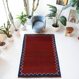 Vintage kilim rug in living room setting, bright colors, wild shaman, soft rug, bold color, Portland, Oregon, rug store, rug shop, local shop, vintage rug, modern kilim, warm colors, antique kilim rug