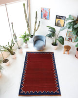 Vintage kilim rug in living room setting, bright colors, wild shaman, soft rug, bold color, Portland, Oregon, rug store, rug shop, local shop, vintage rug, modern kilim, warm colors, antique kilim rug
